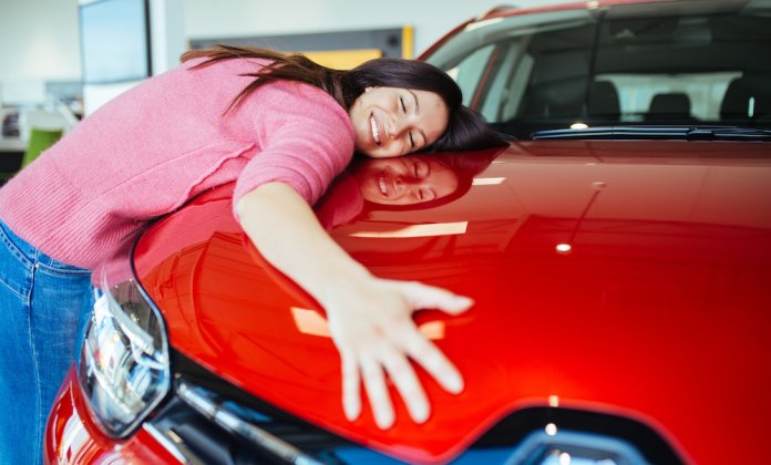 Woman buying a new car