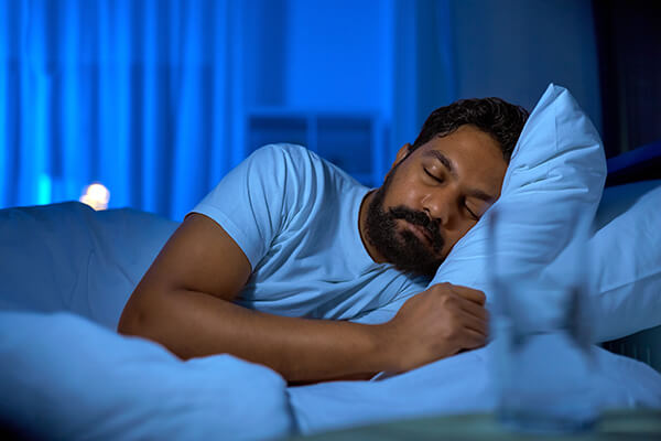 Indian-man-sleeping-on-left-side