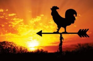 Rooster weathervane at sunrise