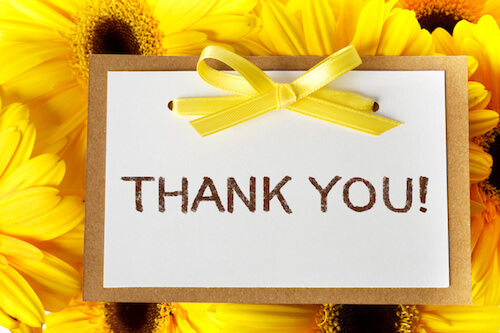 Thank you message card with yellow gerbera daisies