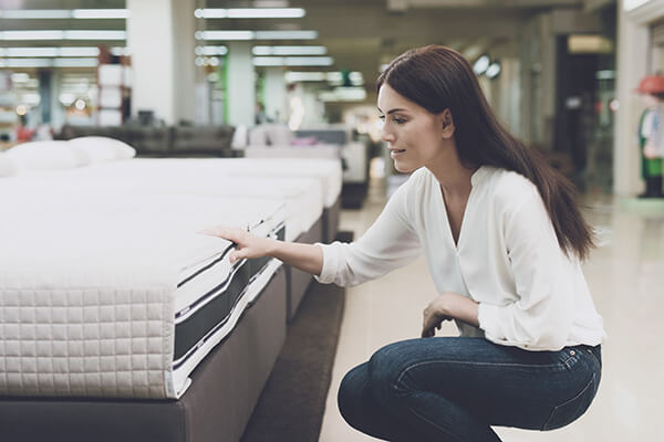 woman-shopping-for-mattress