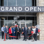 Rafael González Betere, chief executive officer of Flex Bedding Group, cuts the ribbon on the new E.S. Kluft & Company factory in Grand Prairie, Texas.
