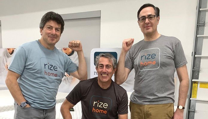 Rize Home CEO David Jaffe, seated, provides strong shoulders for company President Marc Spector, left, and Chief Financial Officer Zev Fredman to lean on — sometimes literally.