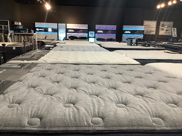 PLENTY OF CHOICES Two dozen mattress choices await shoppers at Esprit Decor.