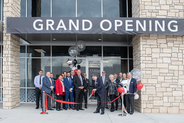 Rafael González Betere, chief executive officer of Flex Bedding Group, cuts the ribbon on the new E.S. Kluft & Company factory in Grand Prairie, Texas.
