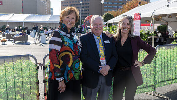 Market Meetup Restonic President and CEO Laurie Tokarz, left, and Vice President of Marketing Julia Rosien join Sleep Savvy’s Dave Perry at the High Point Market in October.