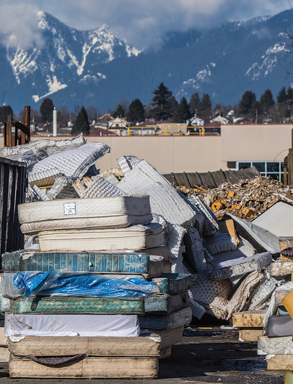 Pile of old mattresses to recycle.