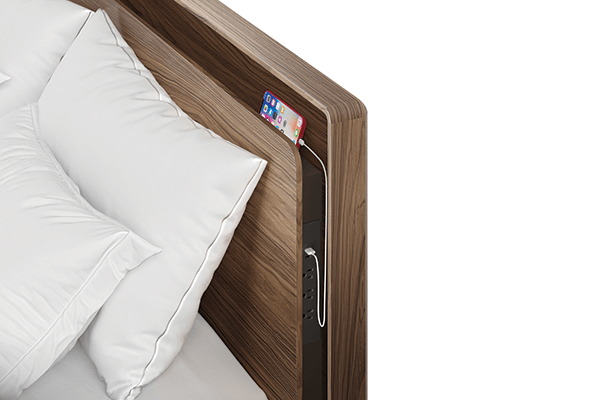 BDI’s new Up-Linq adjustable platform bed has a floating panel that conceals a recessed power center on both sides of the bed for convenient charging through electrical outlets and USB ports.