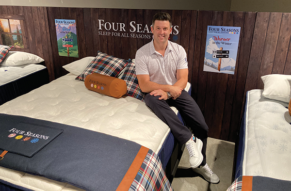 Empowering Retail Success with Spring Air.  Bates got comfortable on the Four Seasons mattress at the summer Las Vegas market. The flippable mattress features Joma Wool on one side for fall/winter, and cooling fibers on the other for spring/summer. Retails start at $1,599 for a queen.