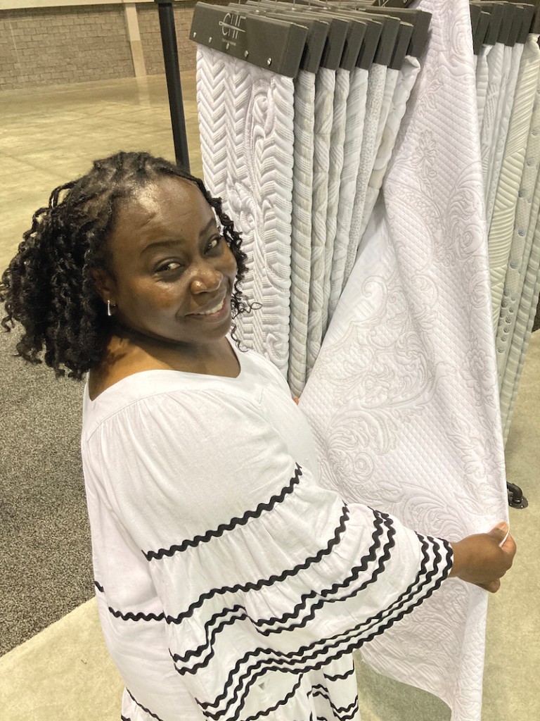 STRIKE A POSE At the ISPA EXPO in 2022, Christina Pennant, Culp’s director of design and merchandising, showed off a mattress fabric inspired by Chanel.