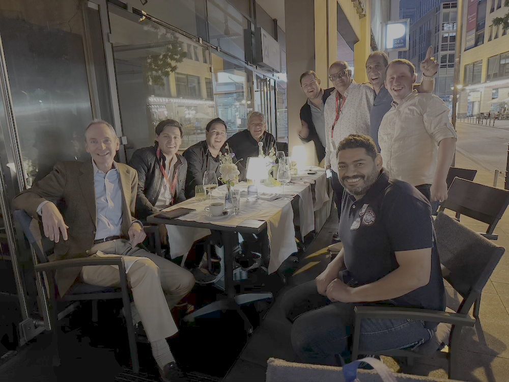 Englander President and CEO Lou Paige (far left) hosts a candlelit dinner on the streets of Cologne for the company’s officials and international licensees.
