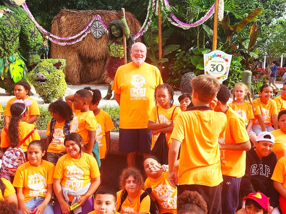 King Koil CEO David Binke stands among the 90 children the company co-hosted at Disney’s Epcot Center in Orlando.