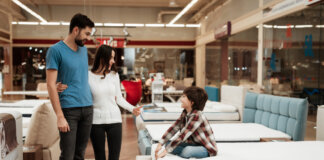 Helping Parents Choose a Mattress for a Growing Child Parents mattress shopping with a child